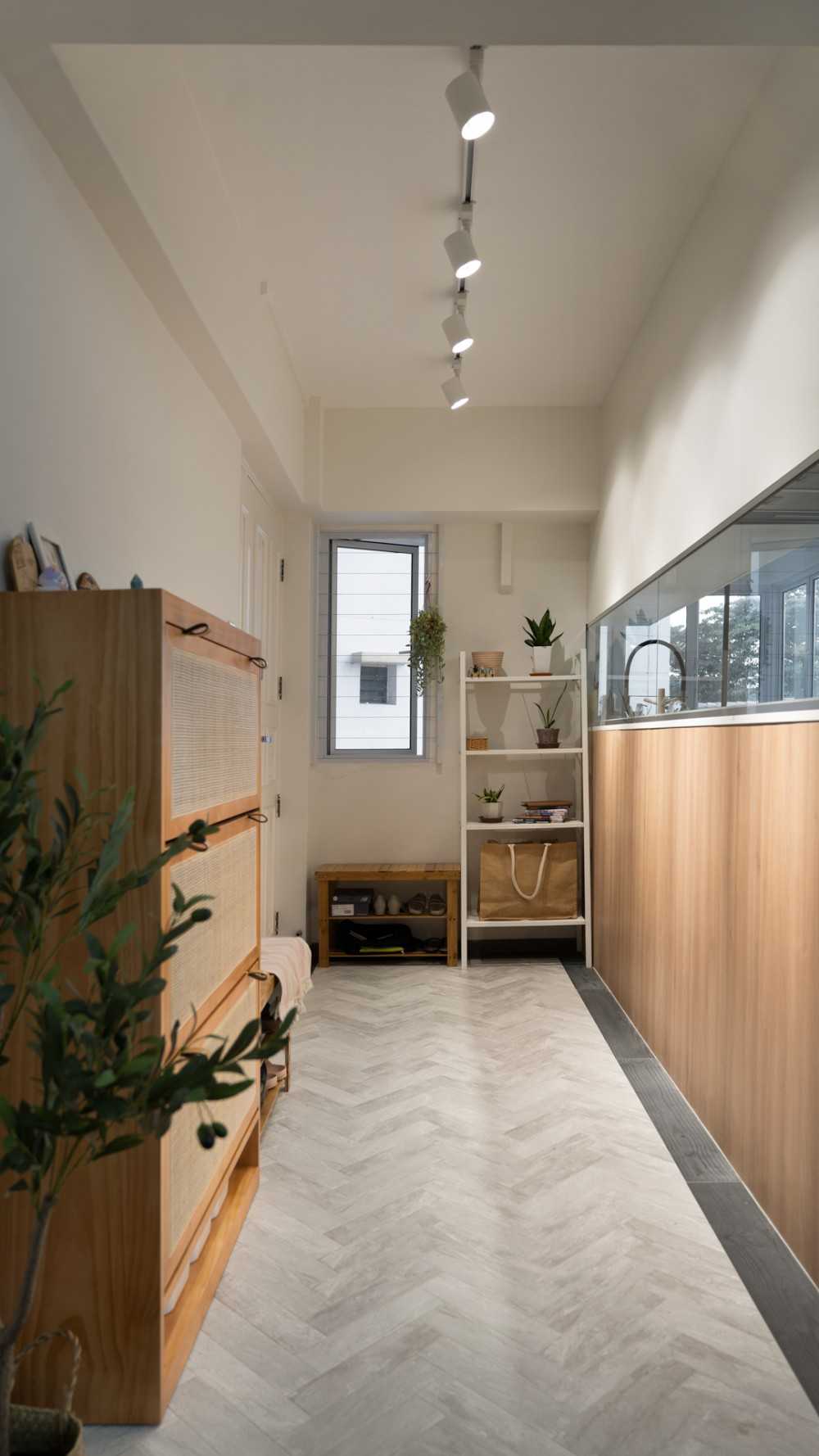 Scandinavian Entryway with Seating Bench and Shoe Rack