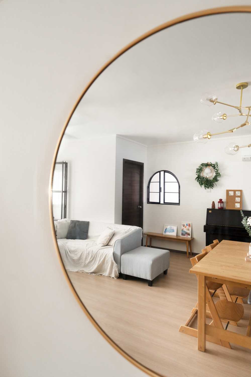 Scandinavian Living Room with Bookshelf and Settee