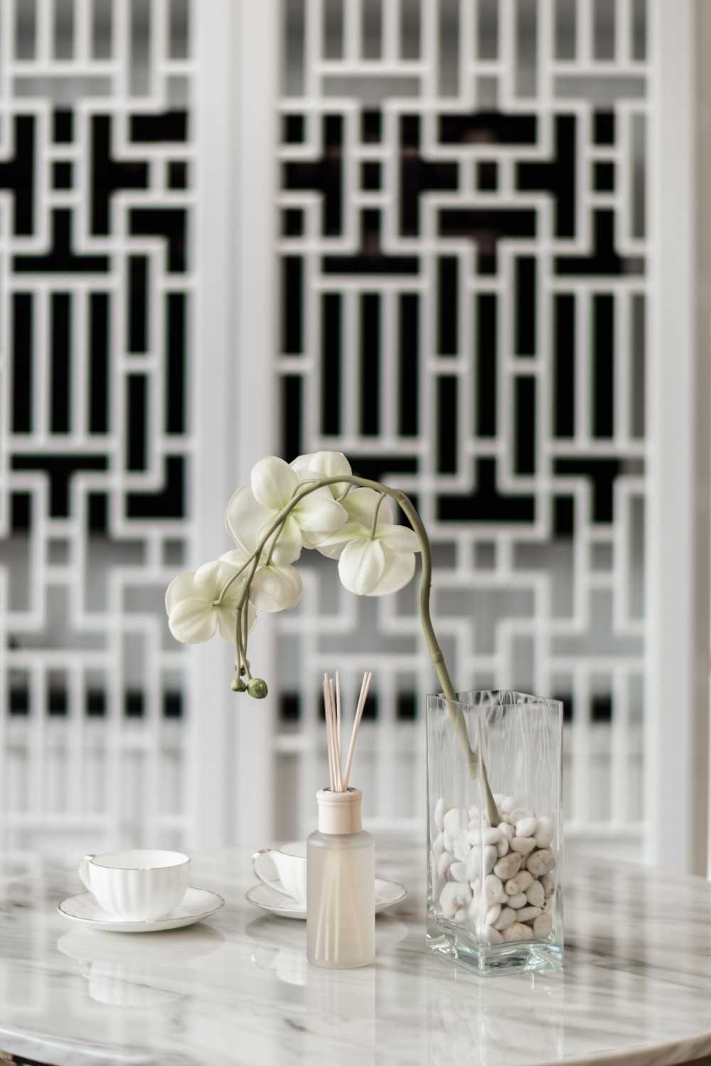 Asian Living Room with TV Console and Feature Wall