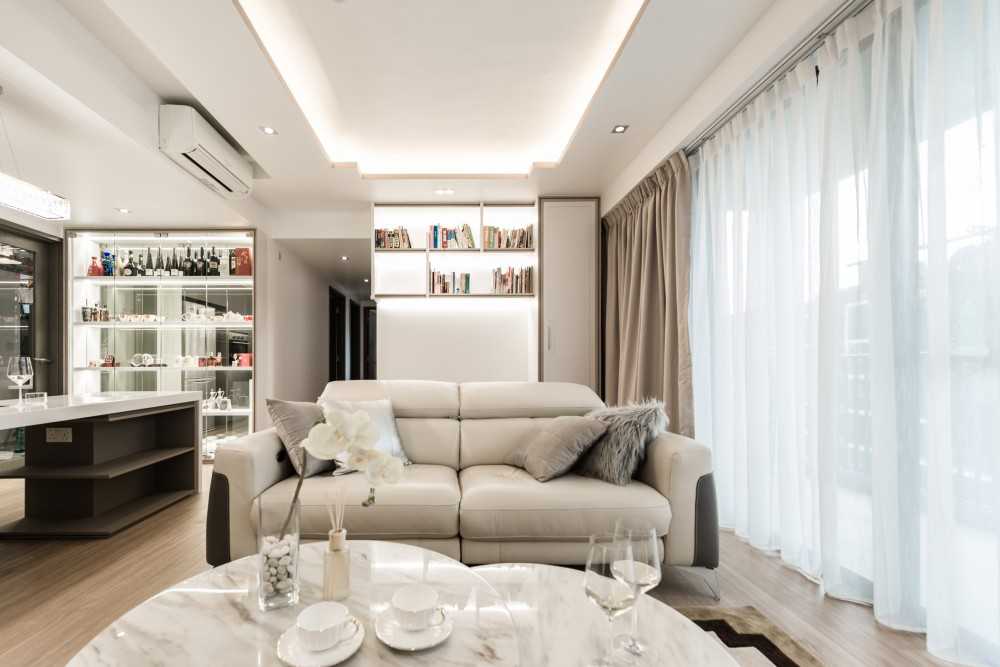Asian Living Room with Cove Lighting and Sofa
