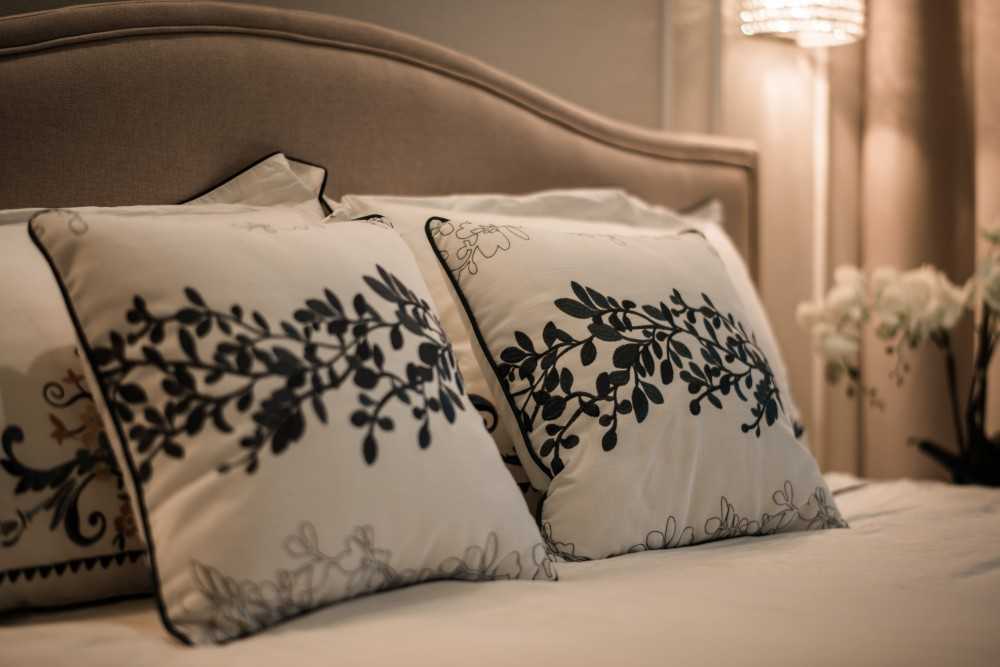 Asian Bedroom with Cove Lighting and Bedside Table