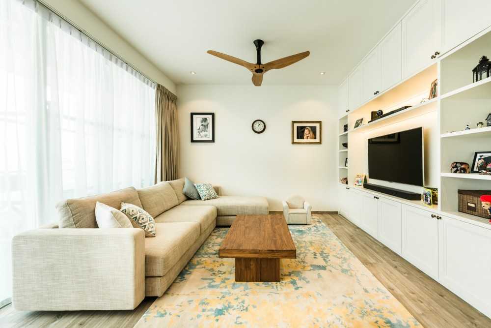 Transitional Living Room with Feature Wall and Cove Lighting