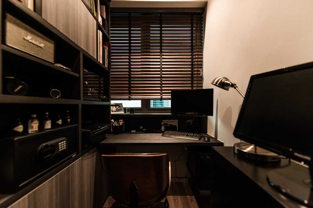 Transitional Study with Cove Lighting and Storage Cabinets