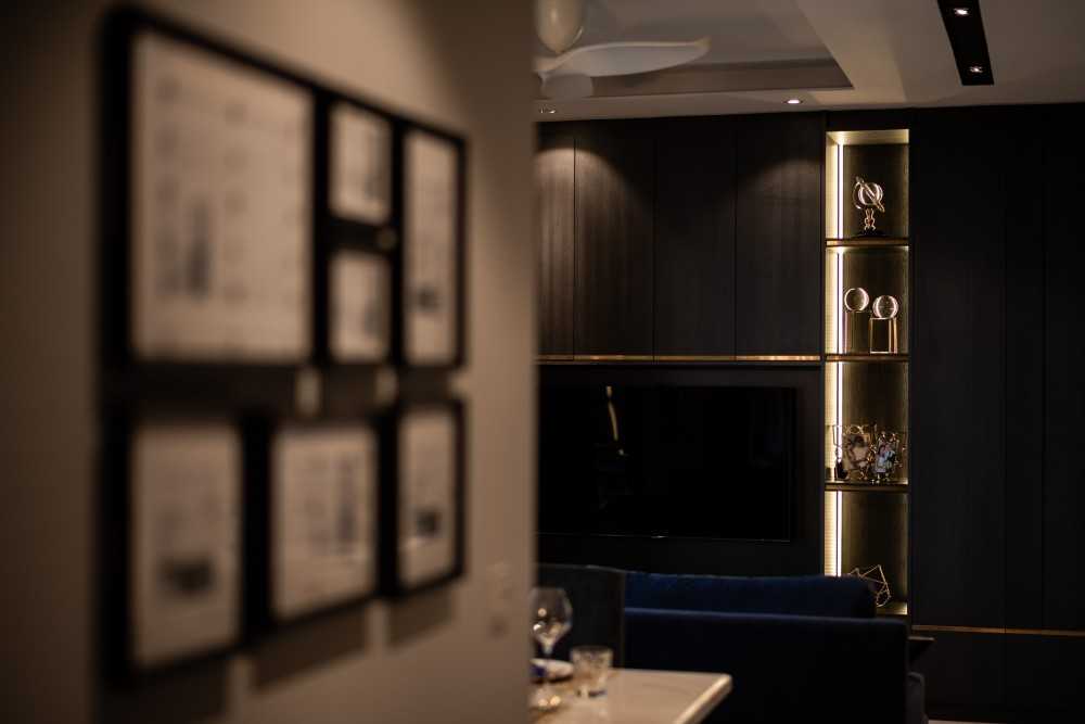 Contemporary Living Room with Feature Wall and Cove Lighting