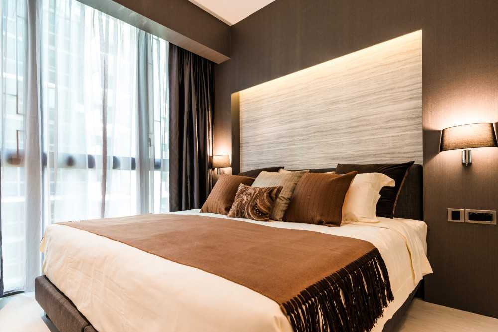 Modern Bedroom with Cove Lighting and Built-in Bed