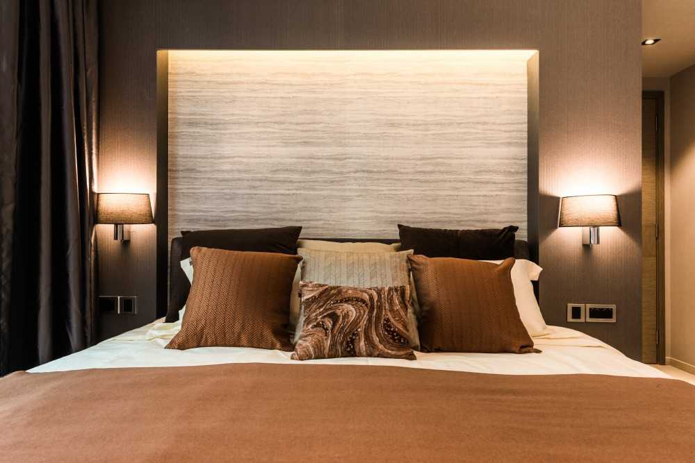 Modern Bedroom with Cove Lighting and Built-in Bed