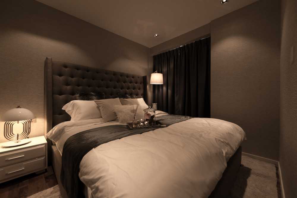 Contemporary Bedroom with Cove Lighting and Bedside Table