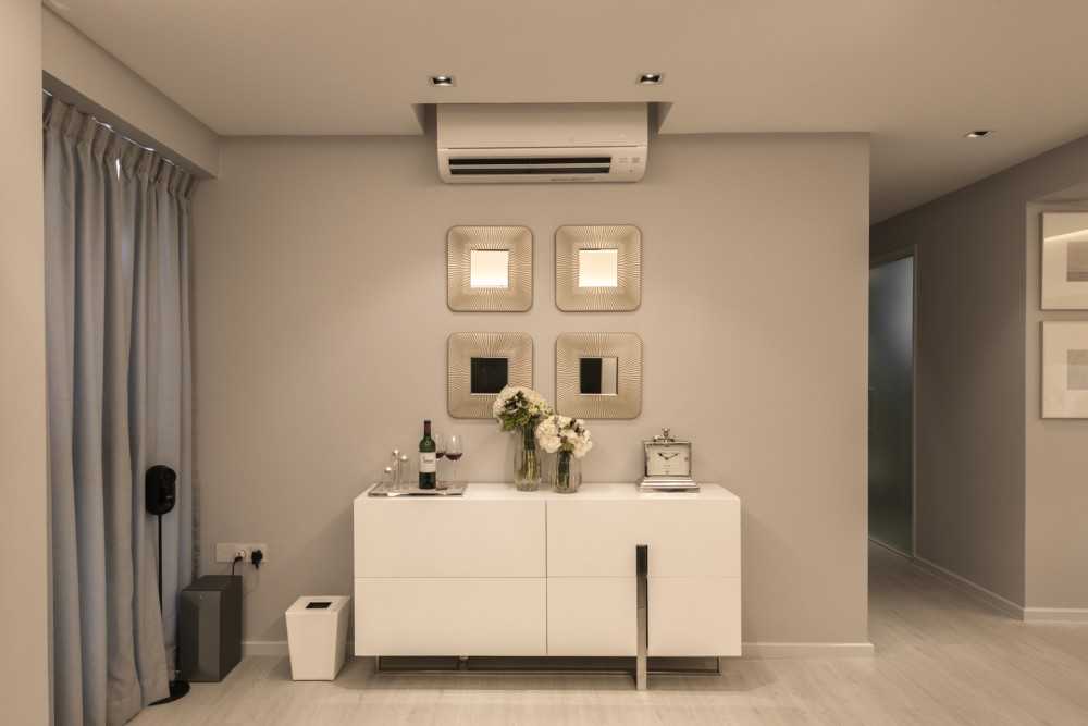 Contemporary Foyer with Artwork and Console Table