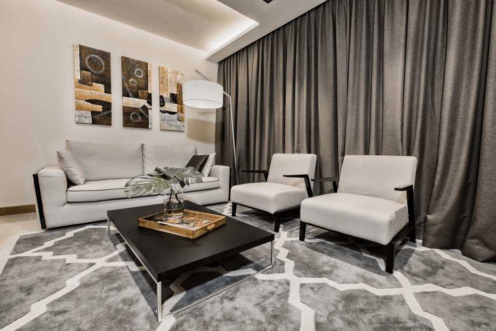 Contemporary Living Room with Cove Lighting and Sofa