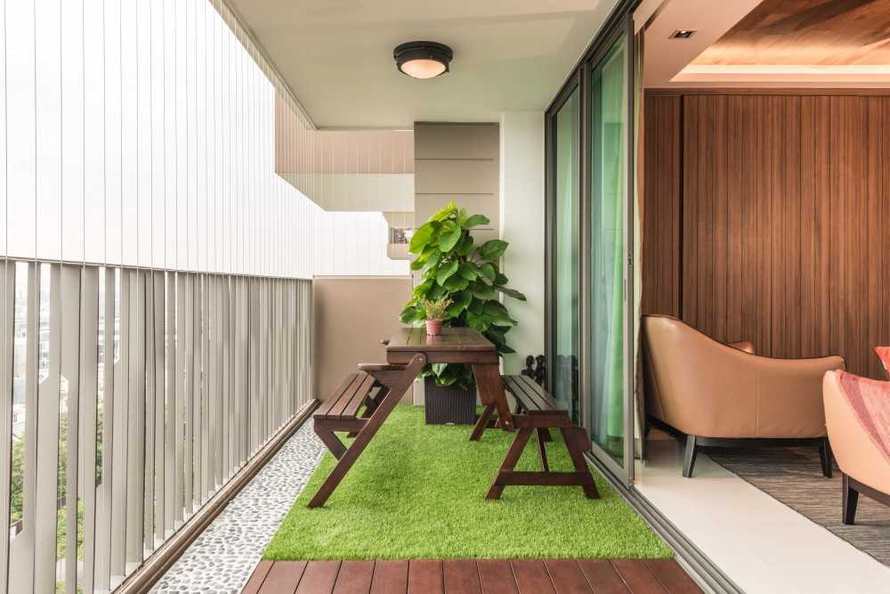 Modern Balcony with Window Grille and Outdoor Table