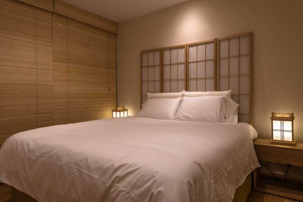 Asian Bedroom with Bedside Table and Queen Bed
