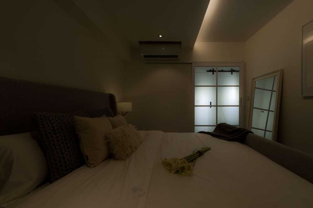 Scandinavian Bedroom with Cove Lighting and Bedside Table