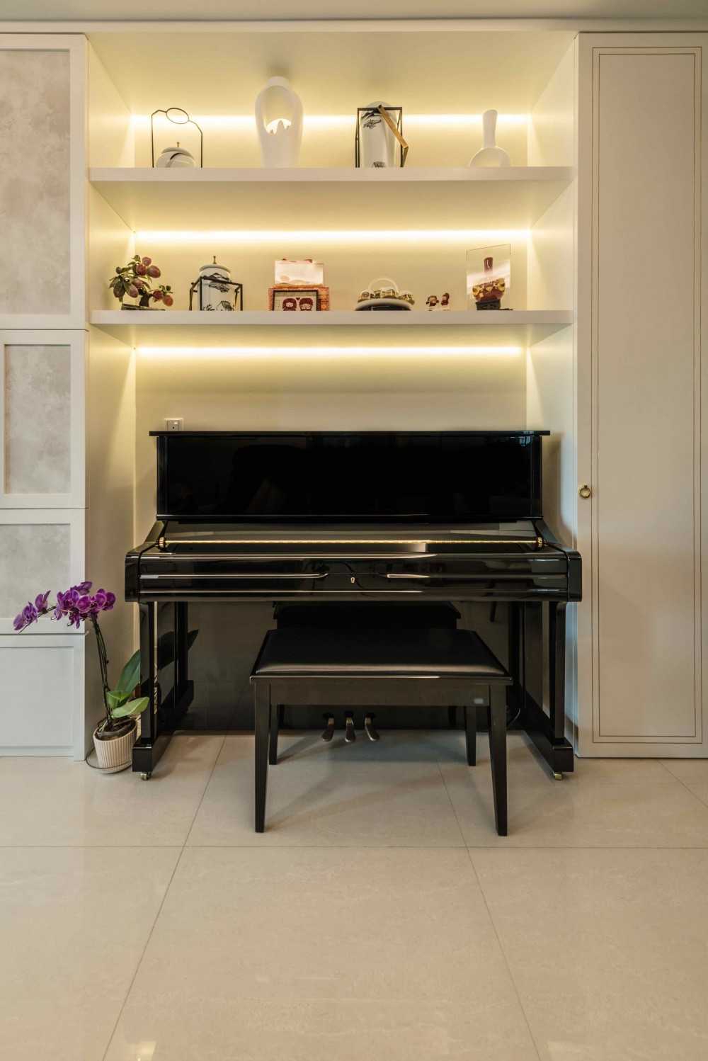 Asian Living Room with Feature Wall and Cove Lighting