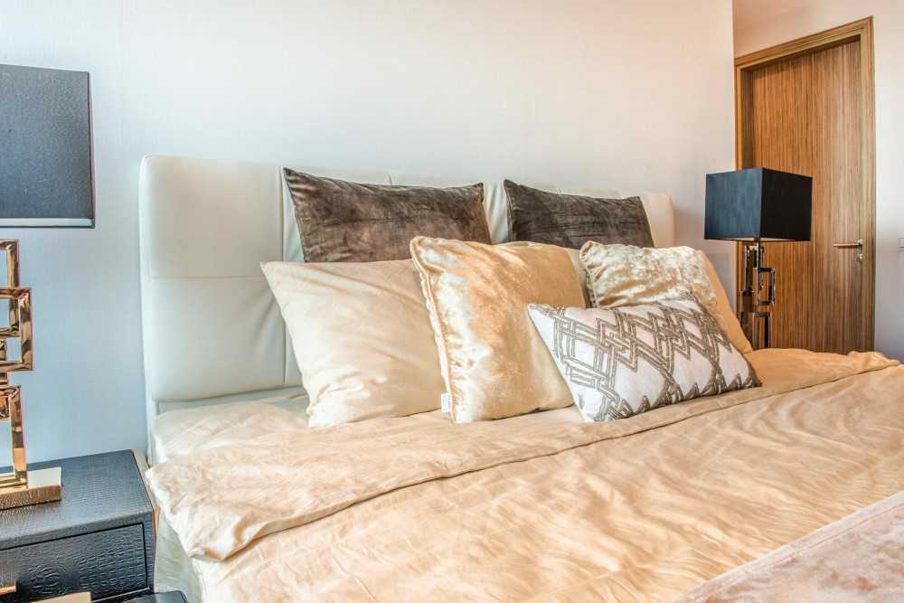 Asian Bedroom with Bedside Table and Queen Bed