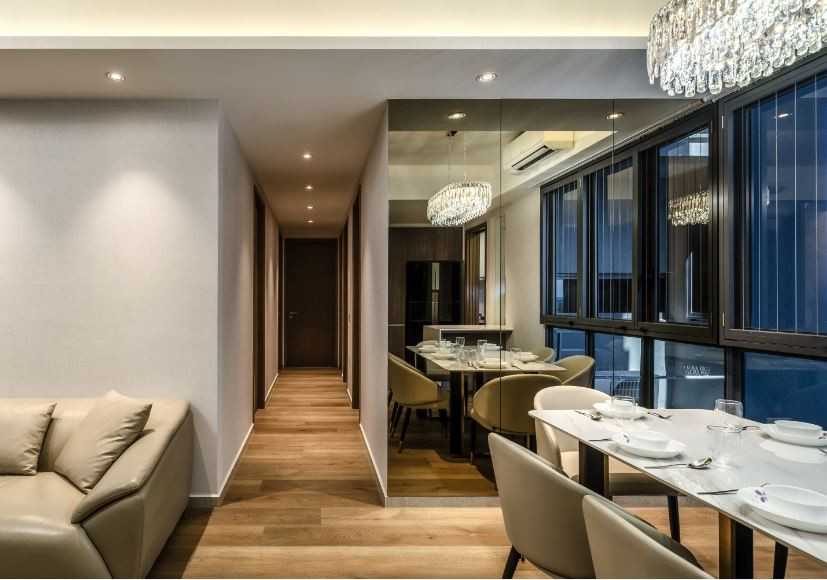 Modern Dining Room with Drop Light and Mirror