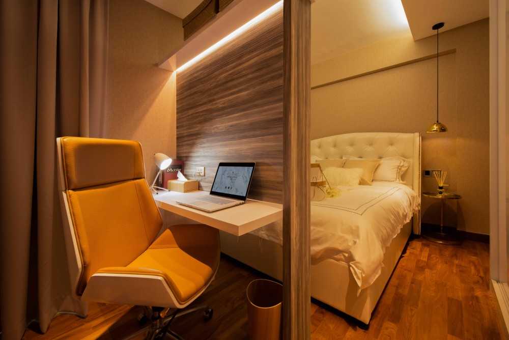 Contemporary Bedroom with Parquet Floor and Bedside Table