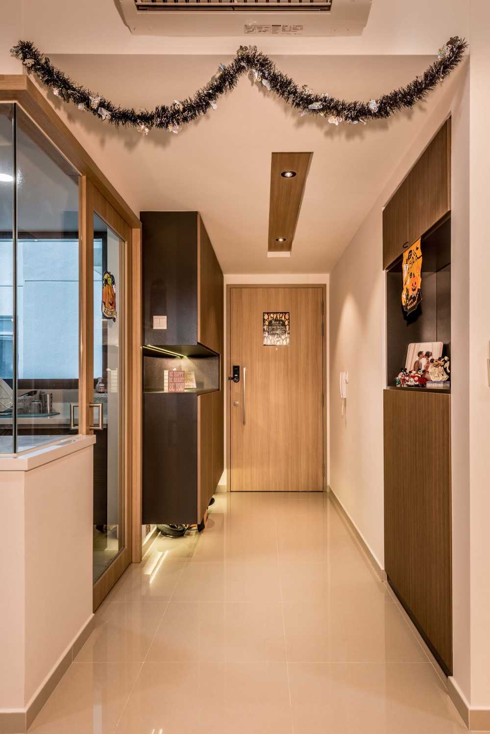 Modern Hallway with Bookshelf and Artwork