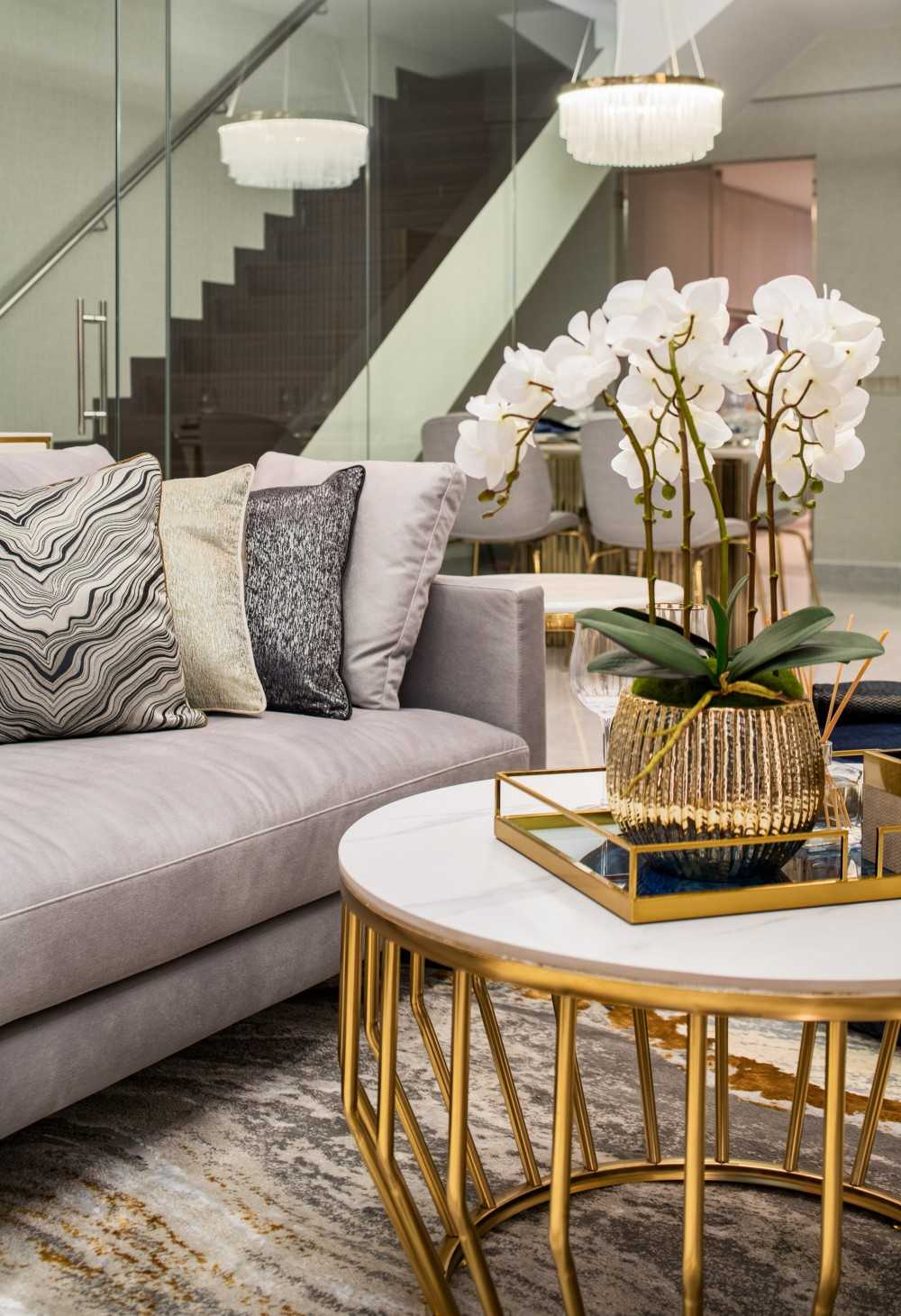 Modern Living Room with Staircase and Sofa