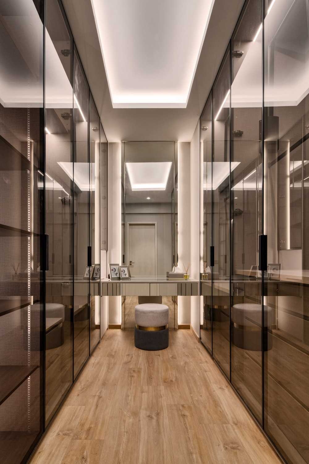 Modern Walk-in Wardrobe with Mirror and Cove Lighting