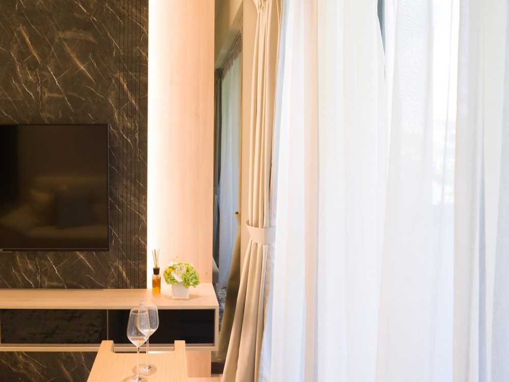 Modern Living Room with TV Console and Feature Wall