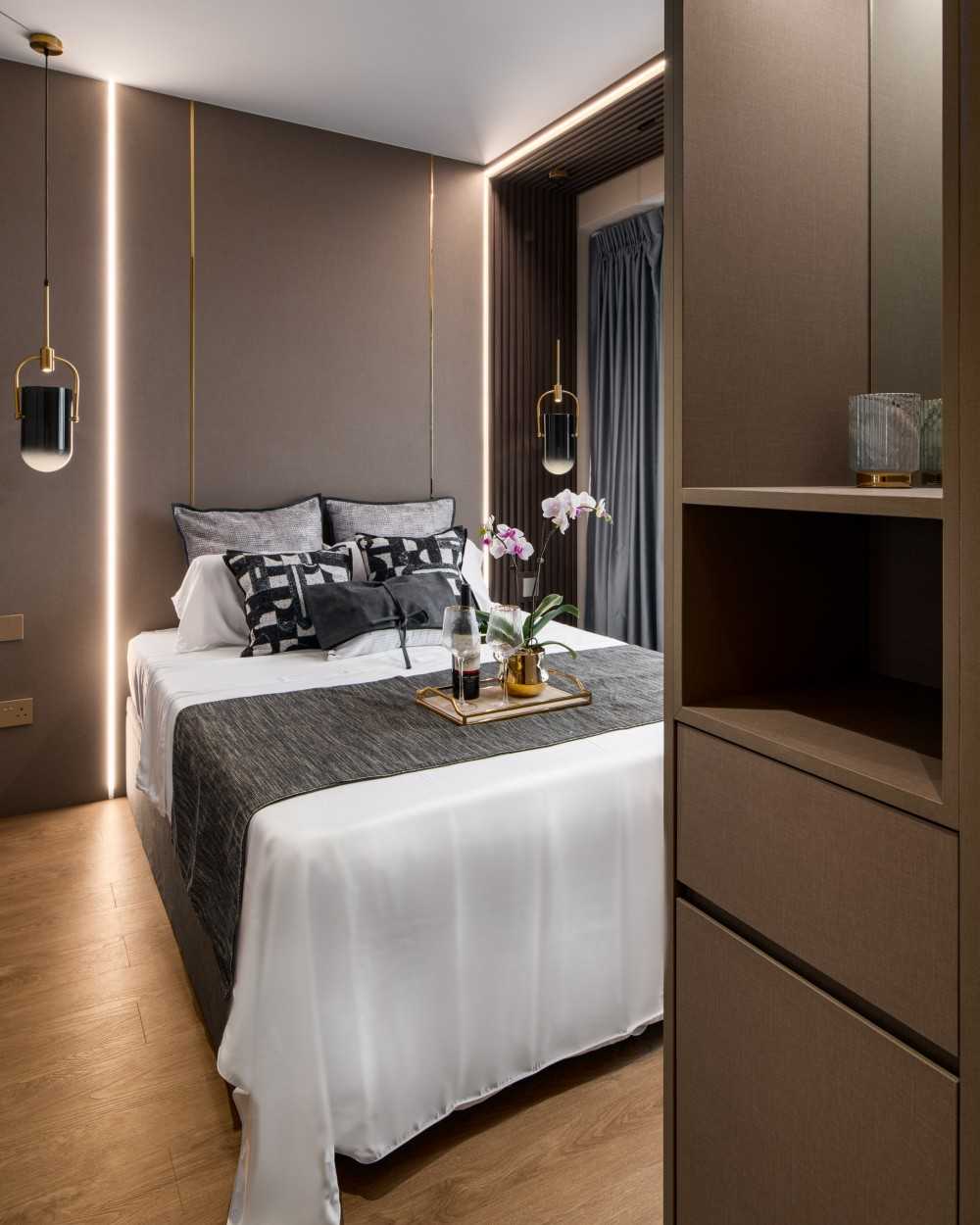 Contemporary Bedroom with Cove Lighting and Wardrobe