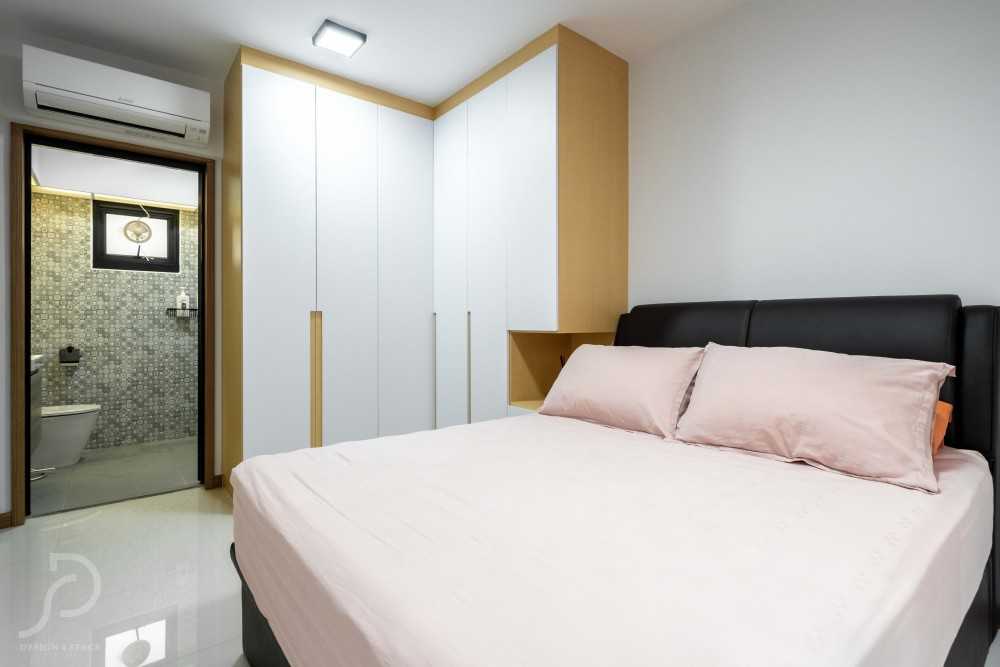 Scandinavian Bedroom with Wood Flooring and Drop Light