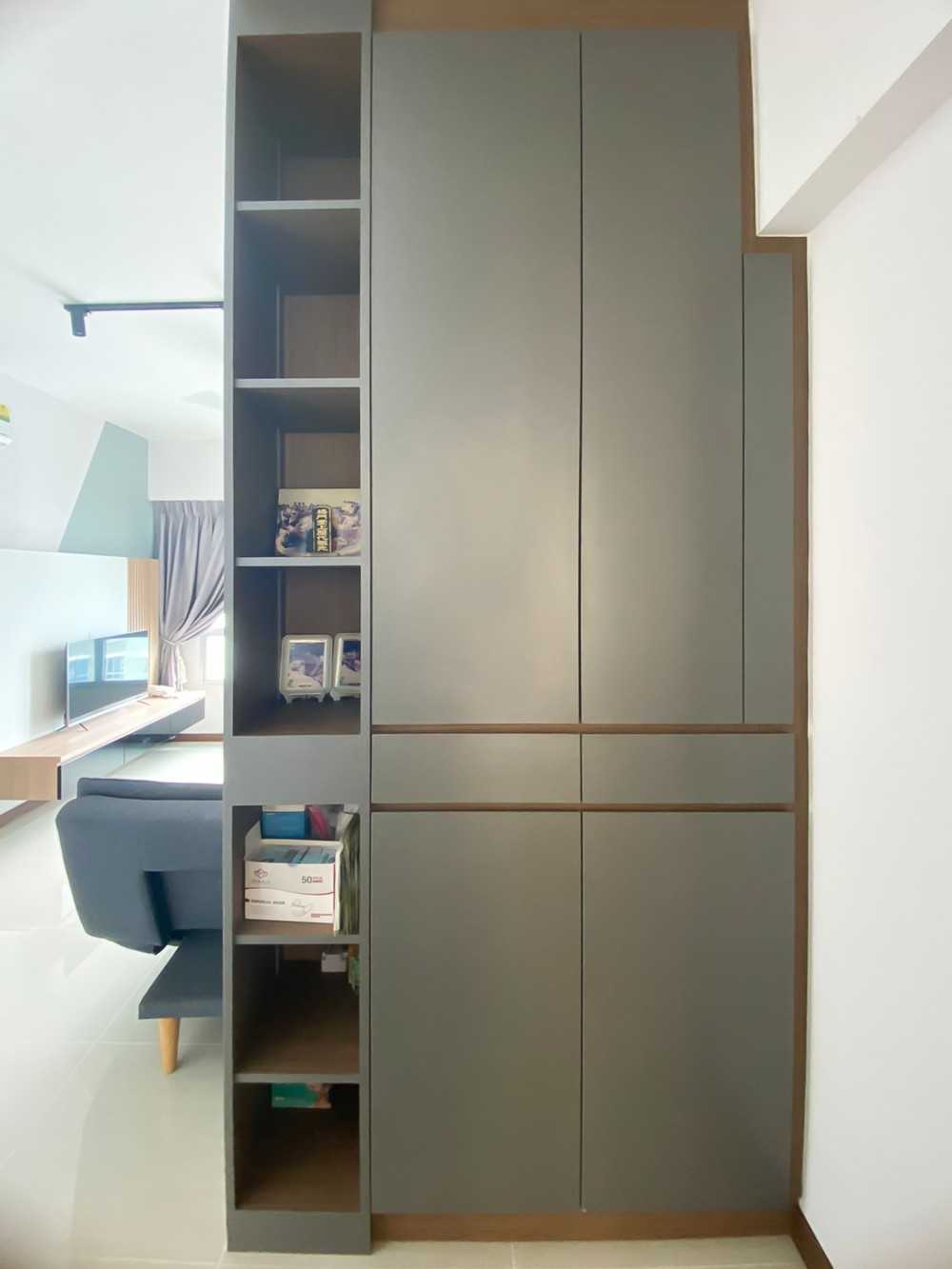 Scandinavian Foyer with Paintings and Storage Cabinets