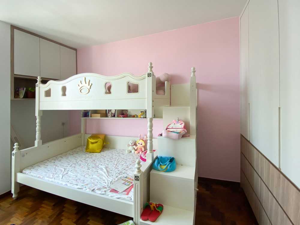 Modern Bedroom with Wardrobe and Paintings