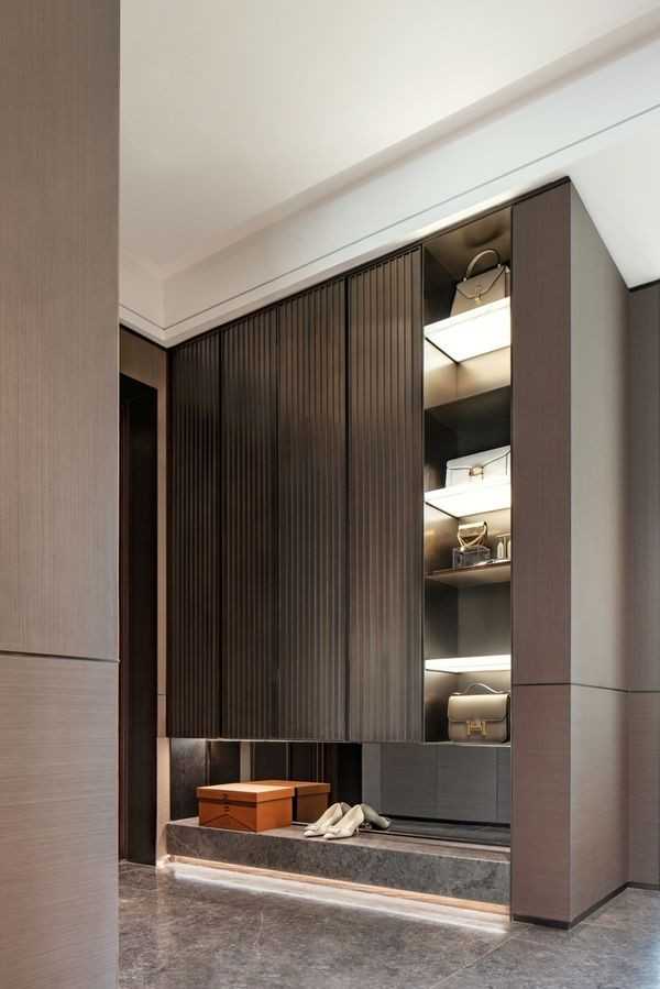 Contemporary Hallway with Homogeneous Tiles and Feature Wall