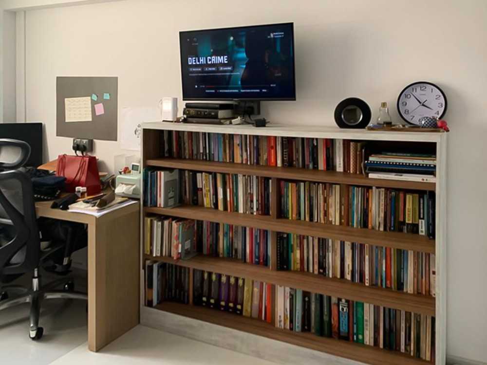 Scandinavian Study with Bookshelf and Paintings