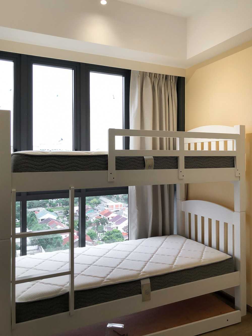 Modern Kids Room with Window Grille and Paintings