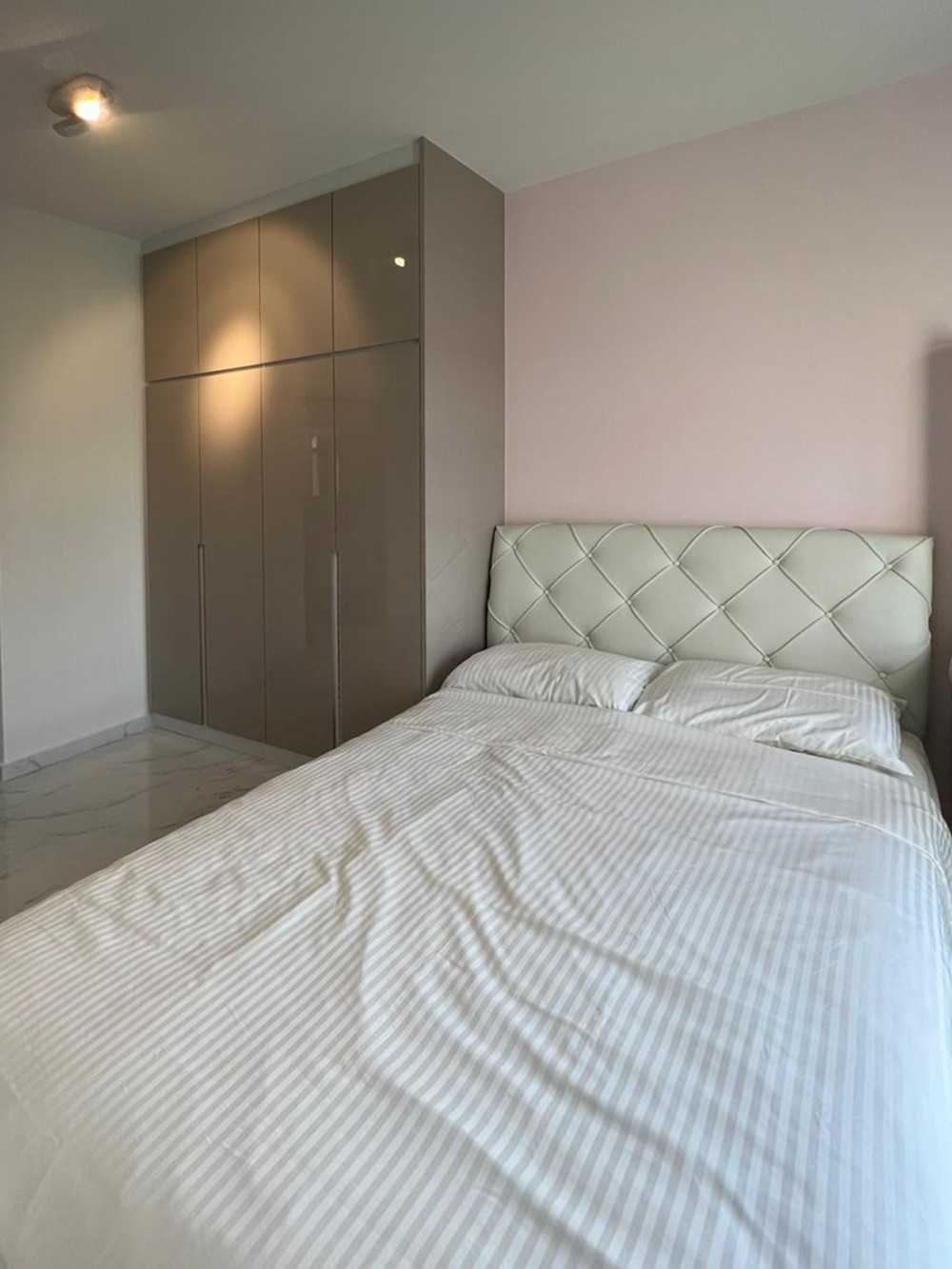 Modern Bedroom with Wardrobe and Paintings