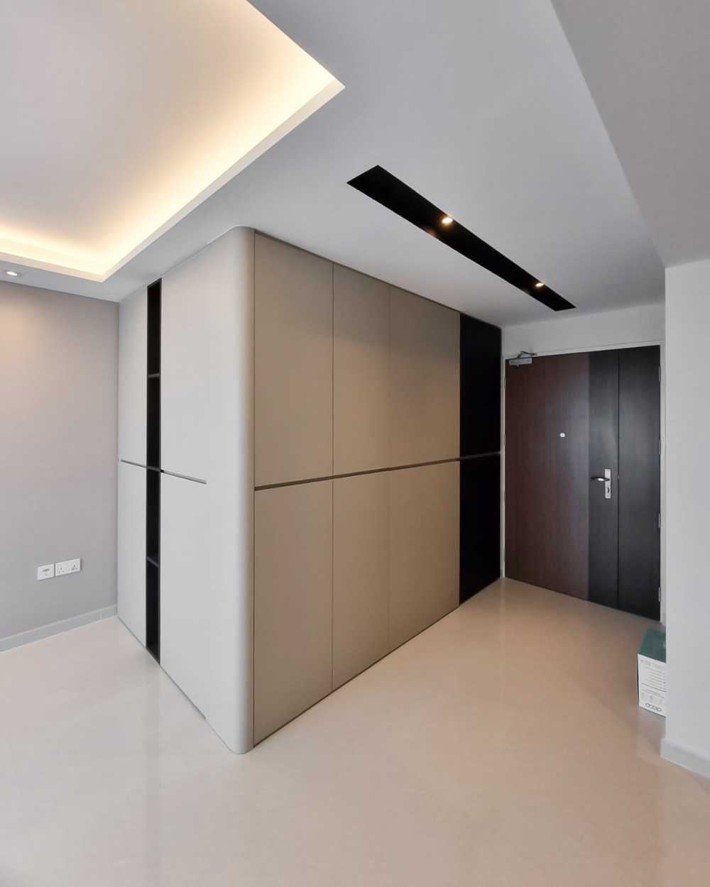 Modern Foyer with Paintings and Storage Cabinets