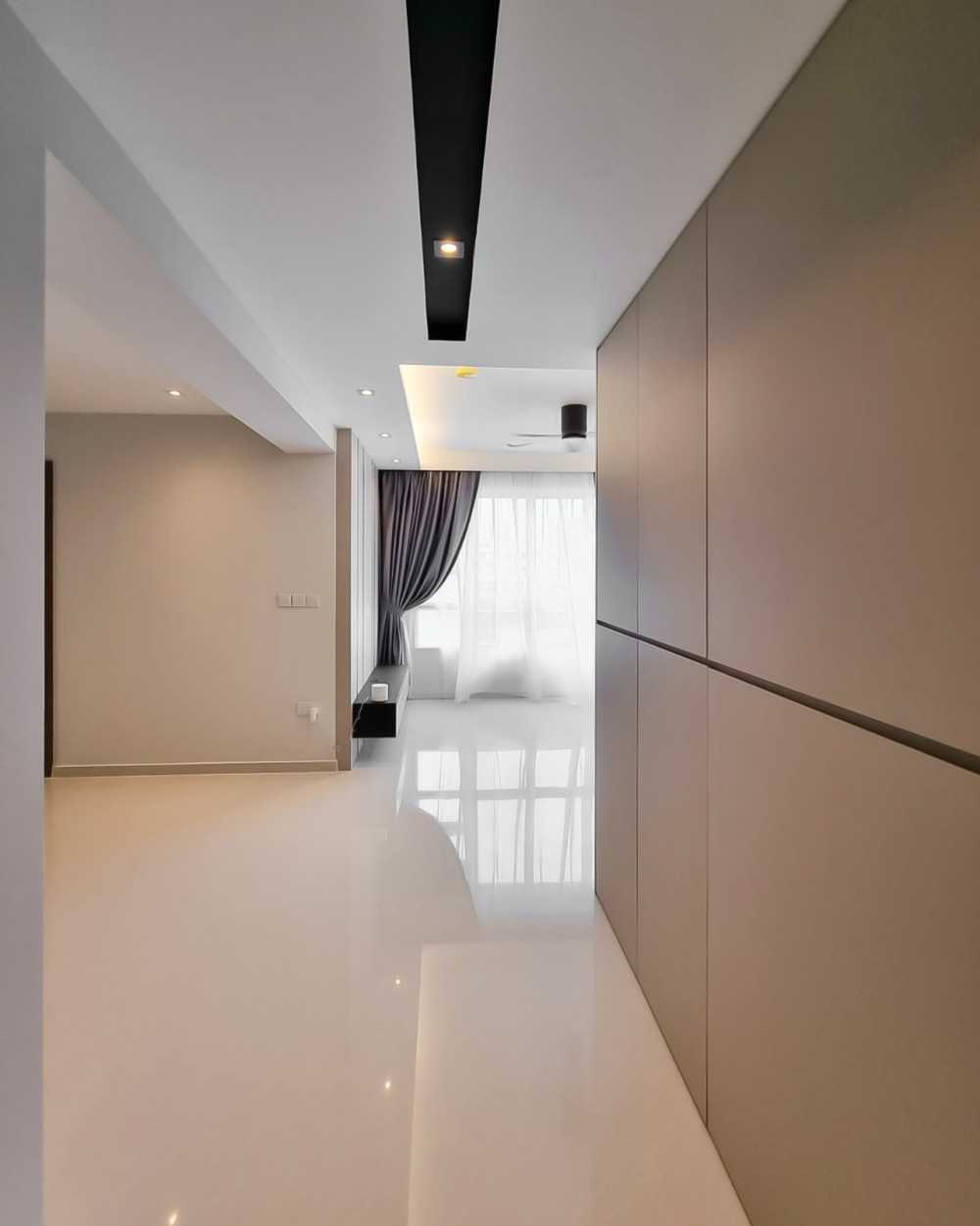 Modern Foyer with Paintings and Storage Cabinets