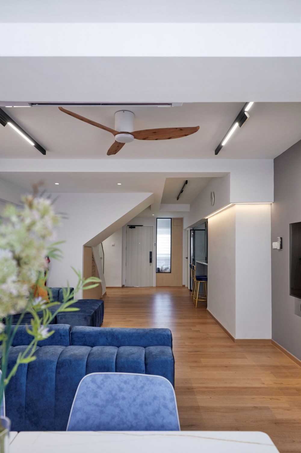 Modern Living Room with Vinyl Flooring and Feature Wall
