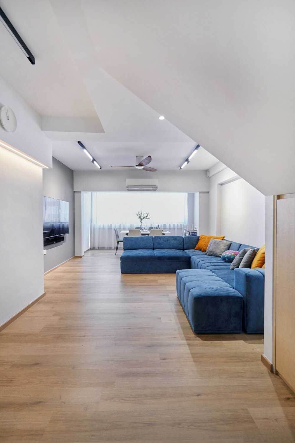 Modern Living Room with Vinyl Flooring and Feature Wall