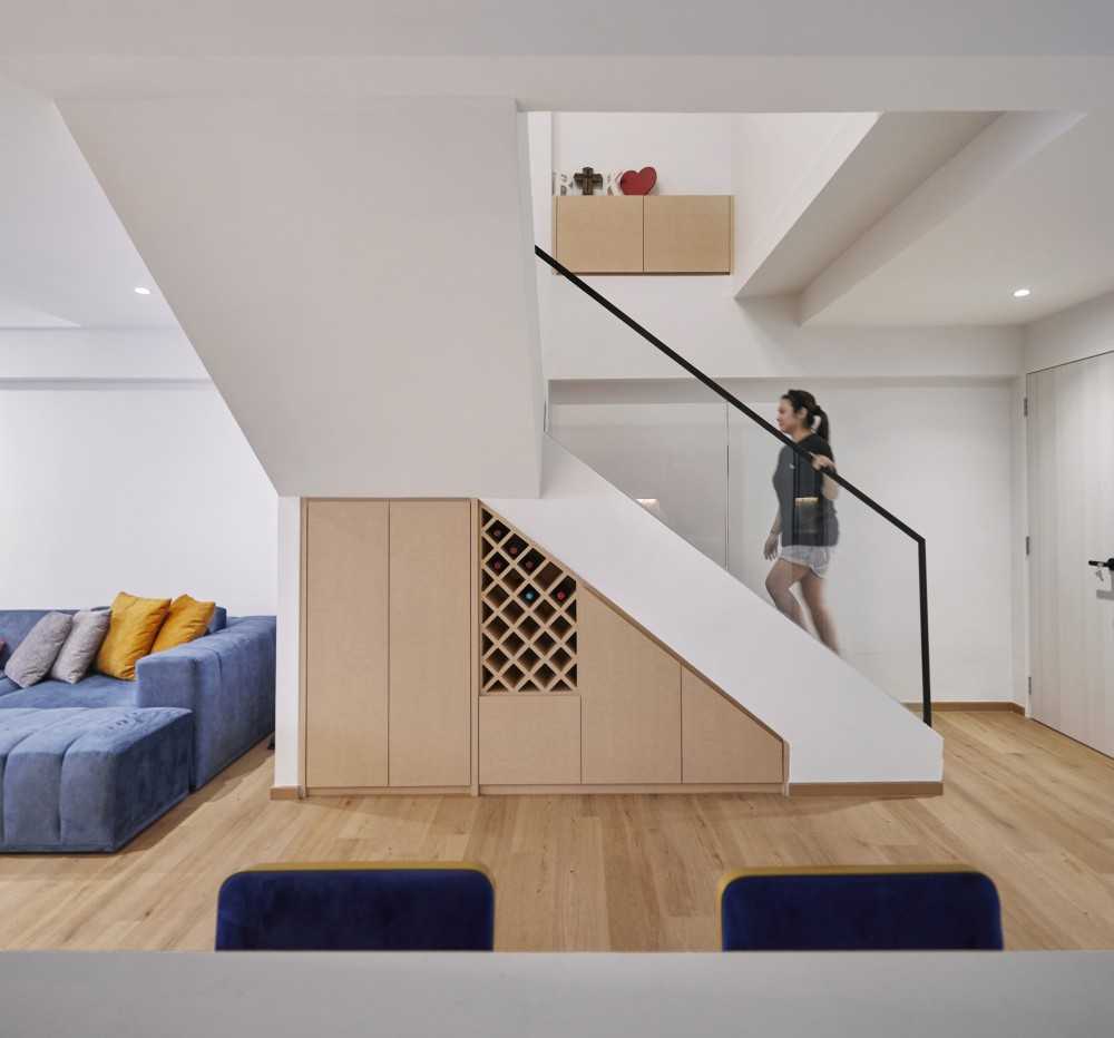 Modern Hallway with Staircase and Storage Cabinets