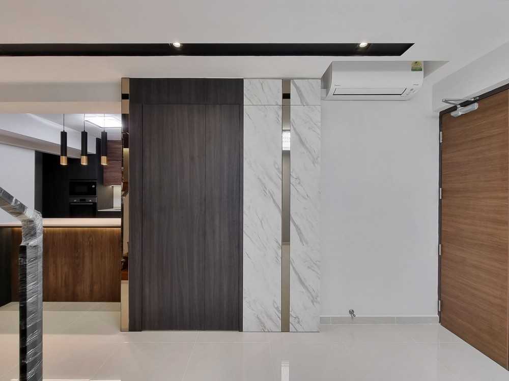 Modern Foyer with Feature Wall and Paintings
