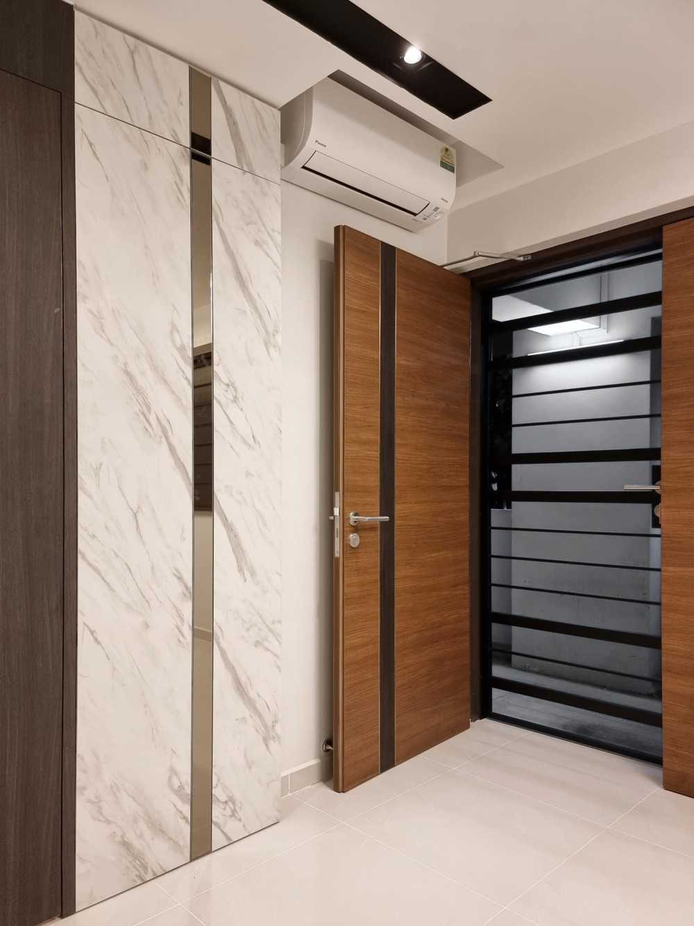Modern Foyer with Paintings and Display Cabinets