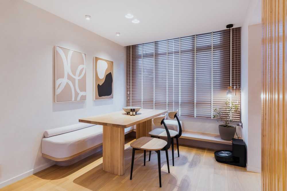 Contemporary Dining Room with Drop Light and Downlights