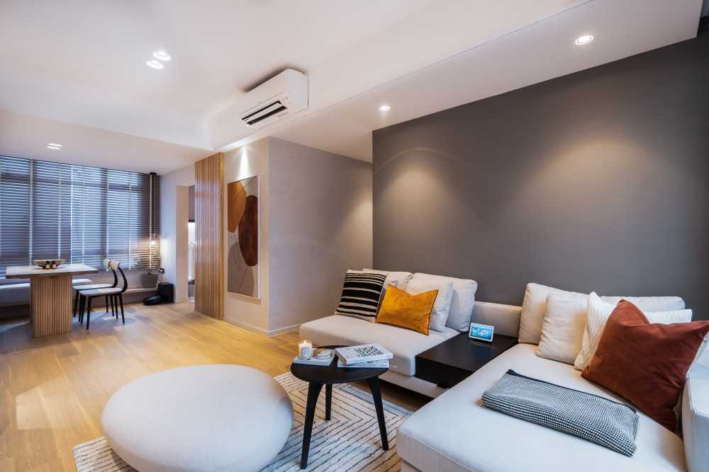 Contemporary Living Room with Wood Flooring and Feature Wall