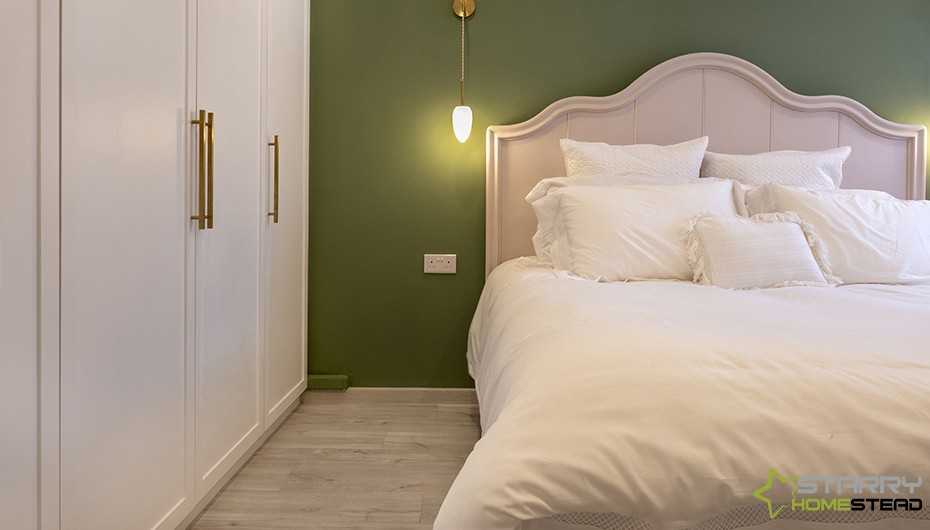 Eclectic Bedroom with Cupboard and Bed