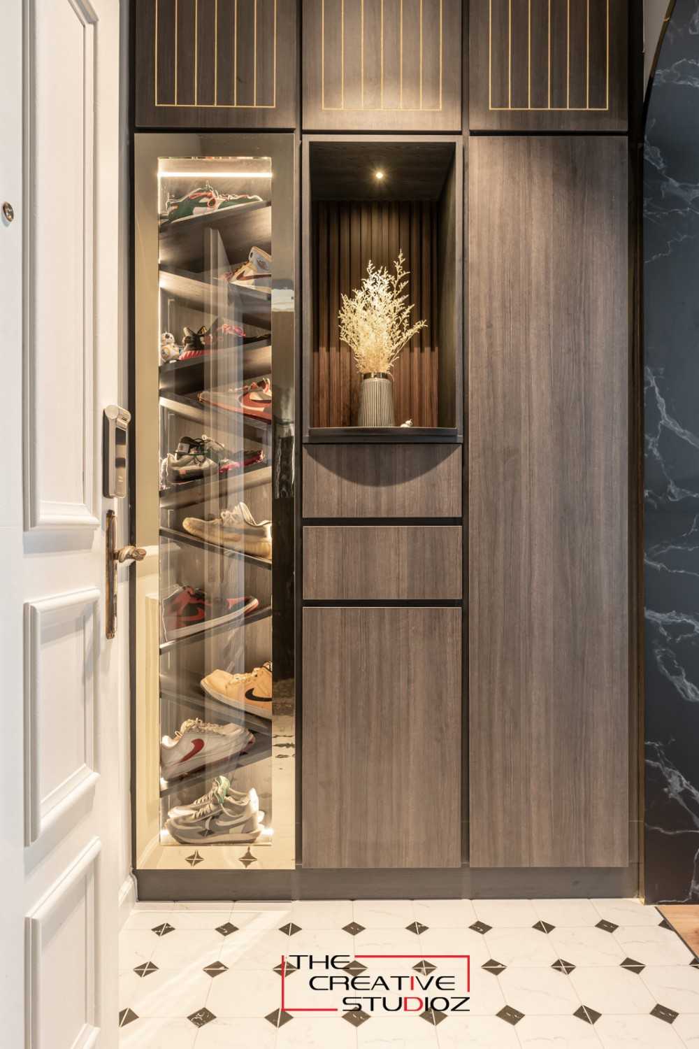 Contemporary Entryway with Artwork and Shoe Rack