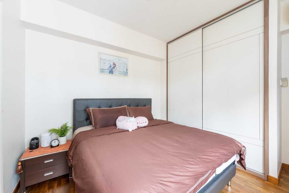 Contemporary Bedroom with Wood Flooring and Wardrobe