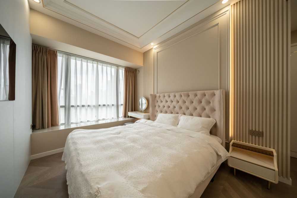 Modern Bedroom with Homogeneous Tiles and Cove Lighting