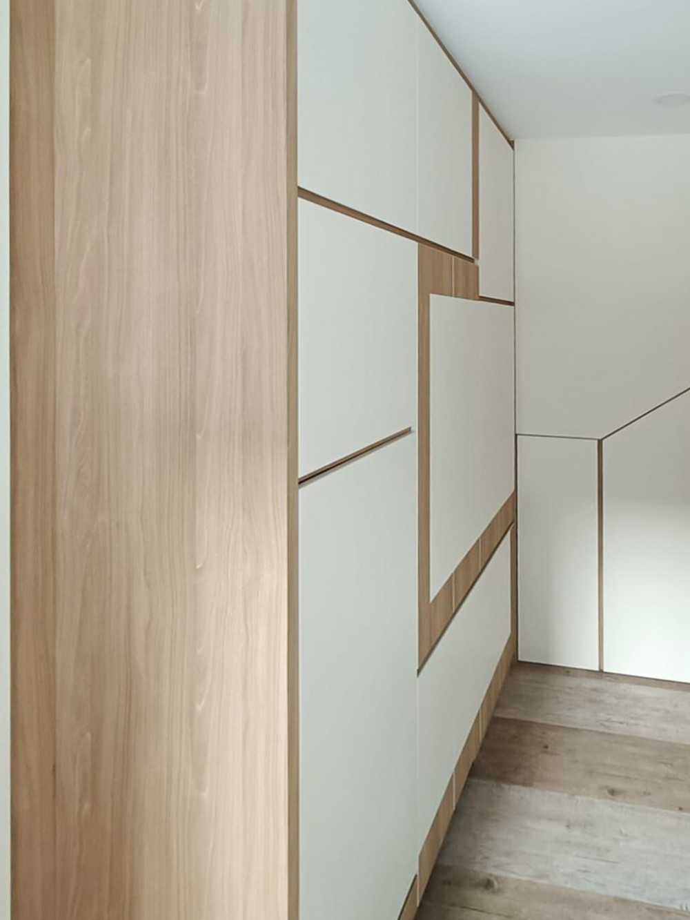 Scandinavian Bedroom with Wardrobe and Paintings