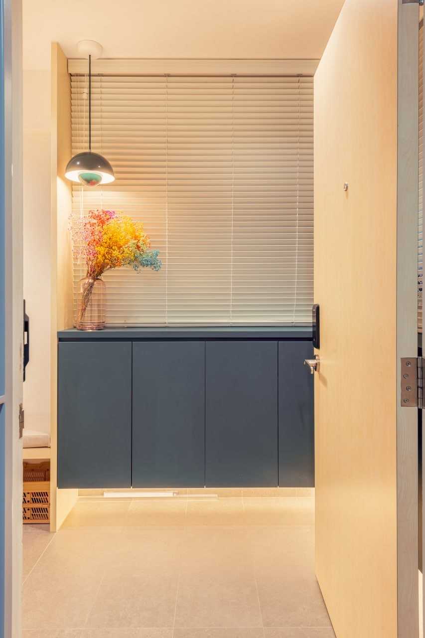 Modern Entryway with Shoe Cabinets and Doors