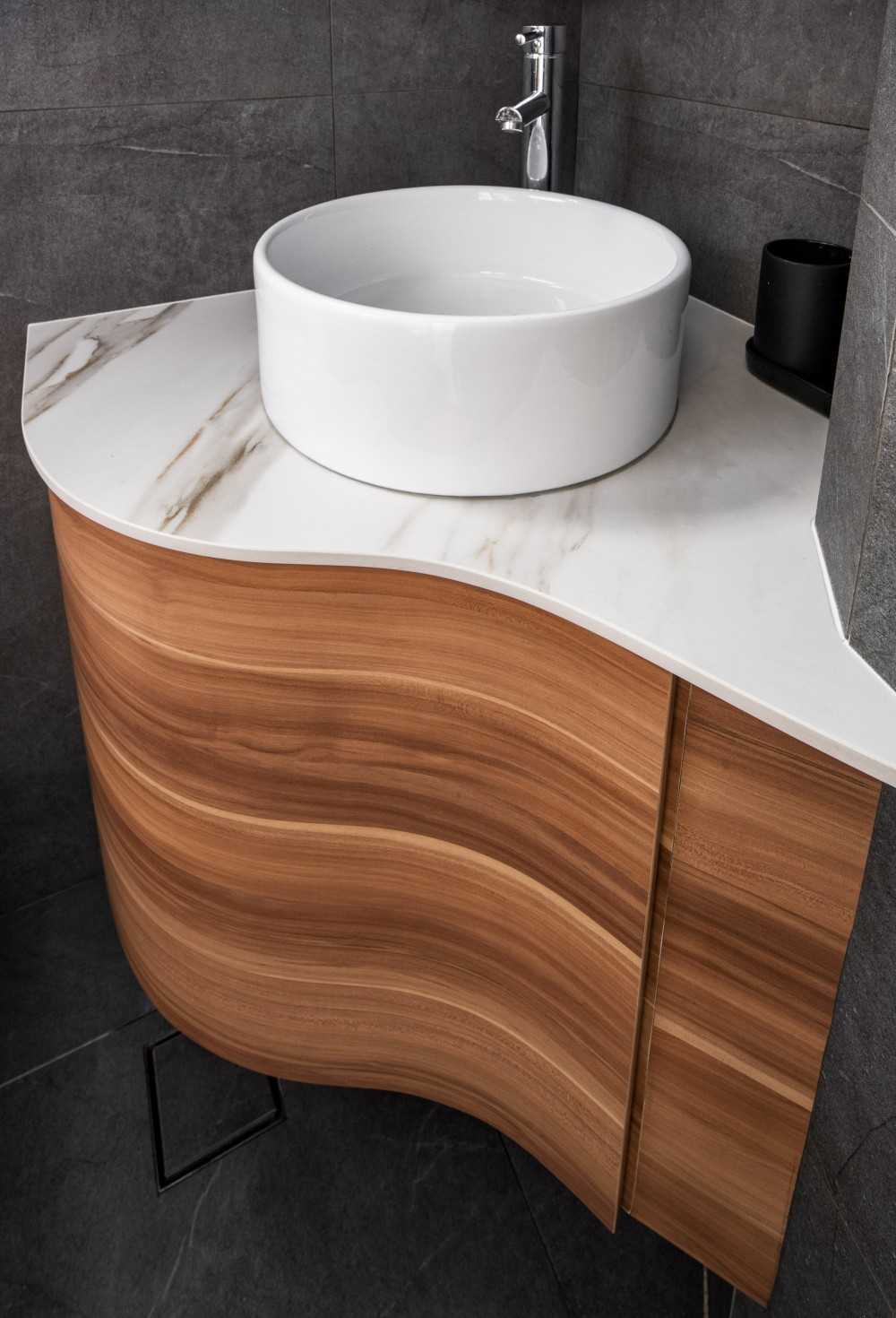 Eclectic Bathroom with Homogeneous Tiles and Mirror