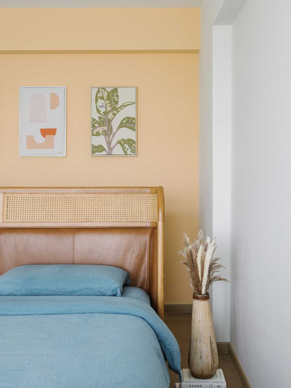 Contemporary Bedroom with Artwork and Bed
