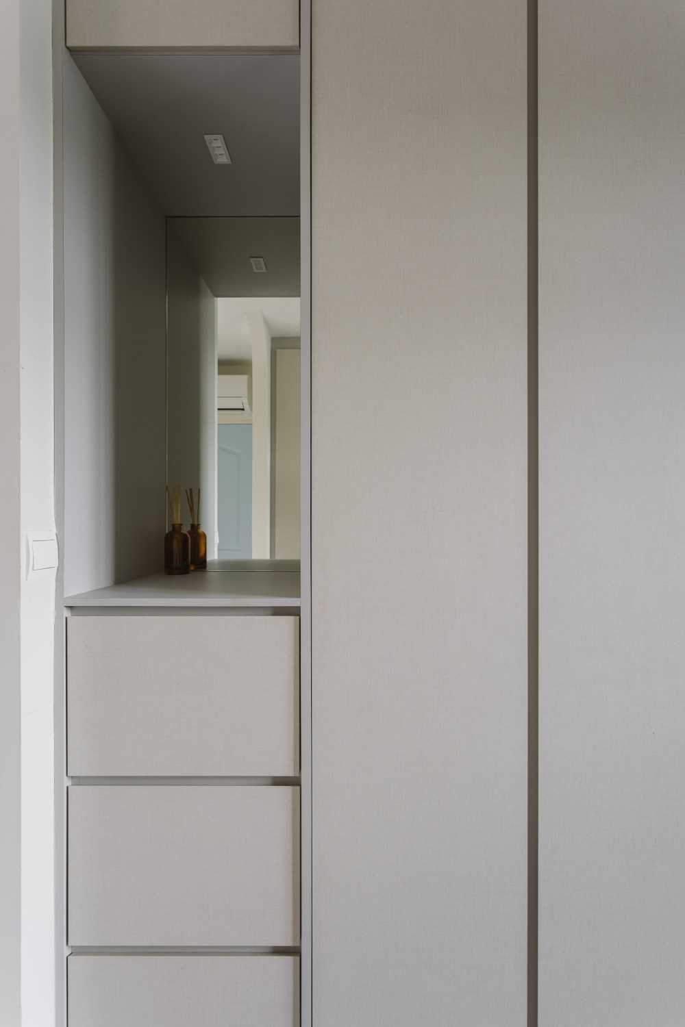 Contemporary Home Office with Mirror and Storage Cabinets
